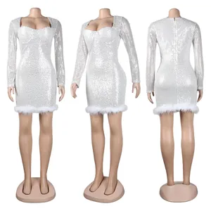 Detailed view of white sequined bodycon mini dress with feather hem and back zipper