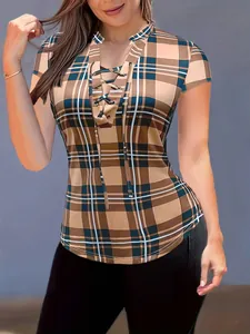 Detailed view of a stylish slim fit plaid top with lace-up neckline and stand collar design