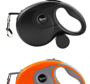 Détail des laisses rétractables automatiques de 8 m en noir et orange pour chiens
