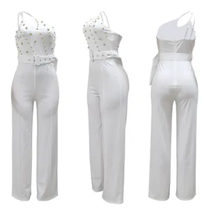 Detailed multi-angle views of a white one-shoulder jumpsuit with gold studded details