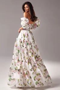 Back view of elegant floral organza maxi dress with puffy sleeves and tiered skirt