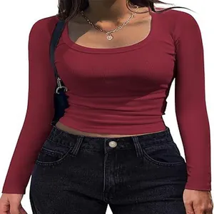 Detail view of a slim-fit burgundy ribbed long-sleeve T-shirt with a stylish square neck.