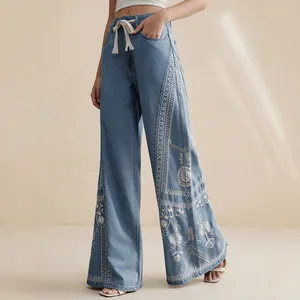 Bohemian floral embroidered high-waisted wide-leg denim jeans with white drawstring waist