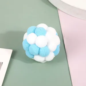 Soft blue and white plush pompom cat toy ball for interactive play