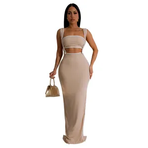 Detail of sexy two-piece bodycon maxi skirt set with strapless crop top