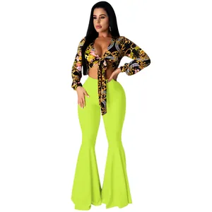 Two-piece set with baroque print tie-front crop top and neon green bell-bottom pants
