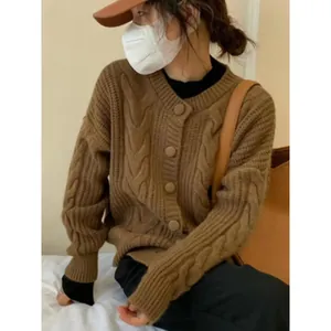 Women's retro brown cable-knit cardigan with round neck and loose fit for autumn.