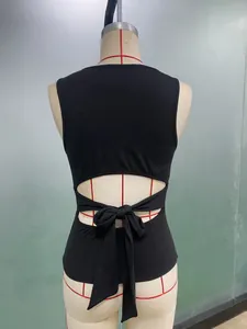 Back view detail of a black sleeveless slim-fit tank top with a bow tie-back design.