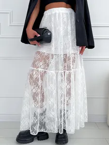 Jupe longue évasée en dentelle blanche transparente pour femme avec motif floral élégant