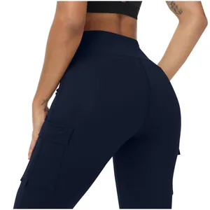 Close-up of navy blue high-waisted yoga leggings with side cargo pockets detail