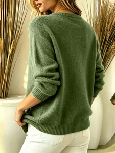 Close-up back view of a premium sage green long sleeve knit sweater for women.