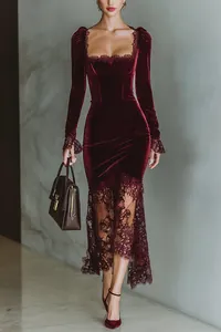 Detail of French burgundy velvet dress with delicate lace trim at hem