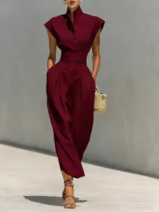 Full view of elegant burgundy high-collar jumpsuit with wide-leg trousers