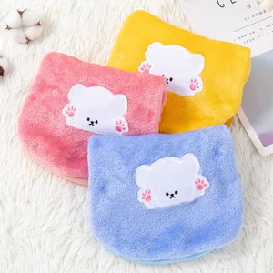Three soft plush pet fleece vests with cute bear appliqué in pink yellow and blue
