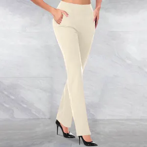 Detailed macro shot of women's high-waisted beige tummy control yoga pants with side pockets