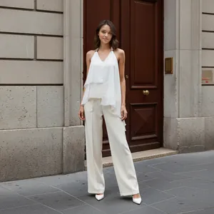 Elegant white asymmetric chiffon halter top for women on a stylish European street