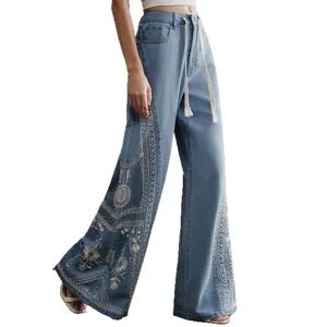 Bohemian high-waist wide-leg denim jeans featuring floral embroidery and drawstring waist