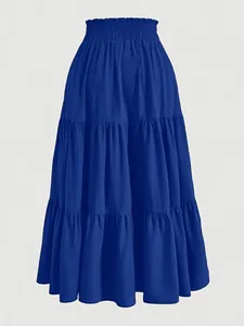 Detail view of a royal blue plus size tiered maxi skirt with a high elastic waist