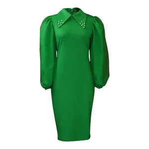 Elegant green pencil dress with decorative pearl-beaded collar and sheer mesh puff sleeves.