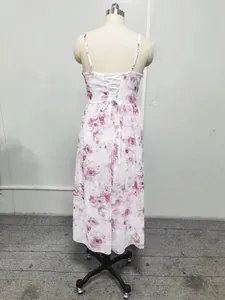 Detailed back view of a floral chiffon dress featuring an elegant lace-up closure.