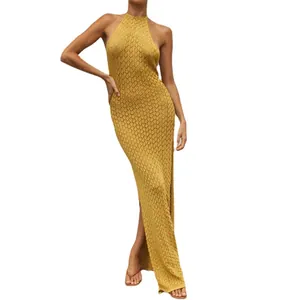 Chic yellow knit sleeveless halter maxi dress featuring hollow out design and side slit