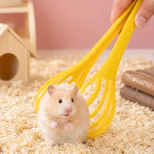 Ergonomic yellow plastic hamster catcher tool for safe pet handling and cage cleaning
