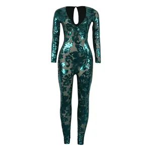 Elegante tuta con paillettes verde smeraldo con inserti in mesh trasparente e scollo a V