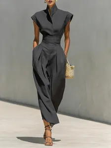 Sophisticated charcoal grey high-neck sleeveless jumpsuit with wide-leg trousers for summer.