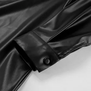 Macro detail of high-quality vintage black PU leather jacket sleeve cuff with button