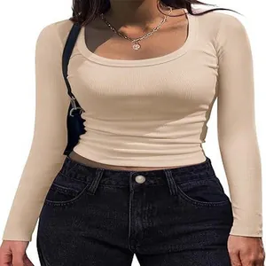 Detail view of a slim fit beige ribbed long sleeve T-shirt with a square neckline