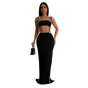Sexy two-piece set featuring a black bandeau top and a suspender maxi skirt with white trim