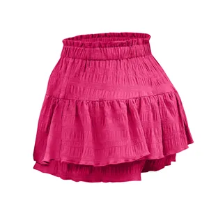 Macro view of the stylish ruffled detail on a bright pink summer mini skort for women