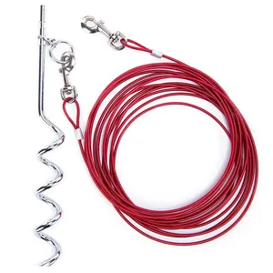 Close-up of red steel wire dog tie-out cable with heavy-duty spiral ground stake