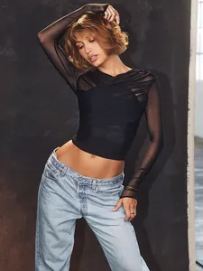 Sexy black sheer mesh long sleeve T-shirt with wrap criss-cross V-neck and slim fit.