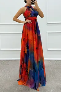Detailed view of a vibrant floral print halter neck sleeveless maxi dress for women.