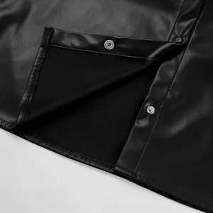 Close-up detail of a vintage black PU leather jacket with warm fleece lining and snap buttons