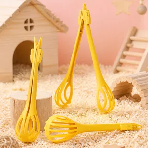 Multipurpose yellow plastic tongs for safe hamster handling and pet cage landscaping decor