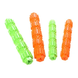 TPR dog chew toys for aggressive chewers in vibrant bright green and orange colors