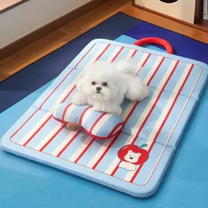 Striped blue pet cooling mat with a matching small pillow for dogs and cats summer bed
