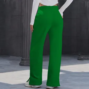 Rear view of vibrant green high-waisted wide-leg lounge pants with side slit detail