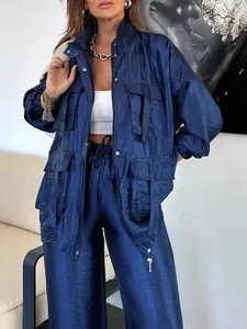 Fashionable navy blue shiny long sleeve cargo jacket with multiple utility pockets