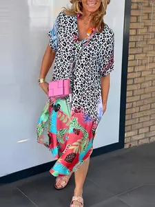 Stylish Bohemian V-neck midi dress featuring mixed leopard and tropical jungle prints