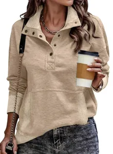 Detail of women's casual sweatshirt with a button-up stand collar and large front pocket