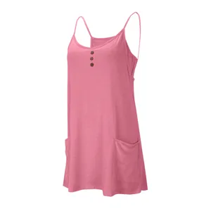 Side perspective of a pink casual sleeveless V-neck dress featuring buttons and pockets