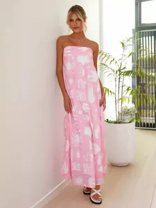 Elegant pink strapless maxi dress with white abstract print patterns for vacation