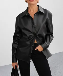 Detailed texture view of the premium vintage black PU leather shirt jacket for women