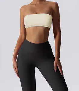 Close-up detail of a women's solid color strapless sports bra bandeau in cream