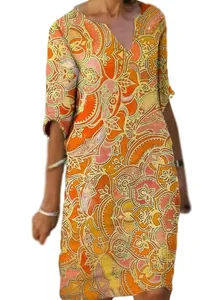 Detailed view of V-neck mid-sleeve dress with colorful bohemian paisley print.
