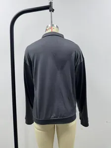 Back view of a men's relaxed fit long sleeve polo shirt in dark grey finish