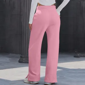 Detailed back view showing the fit and side slit of pink high waisted wide leg pants